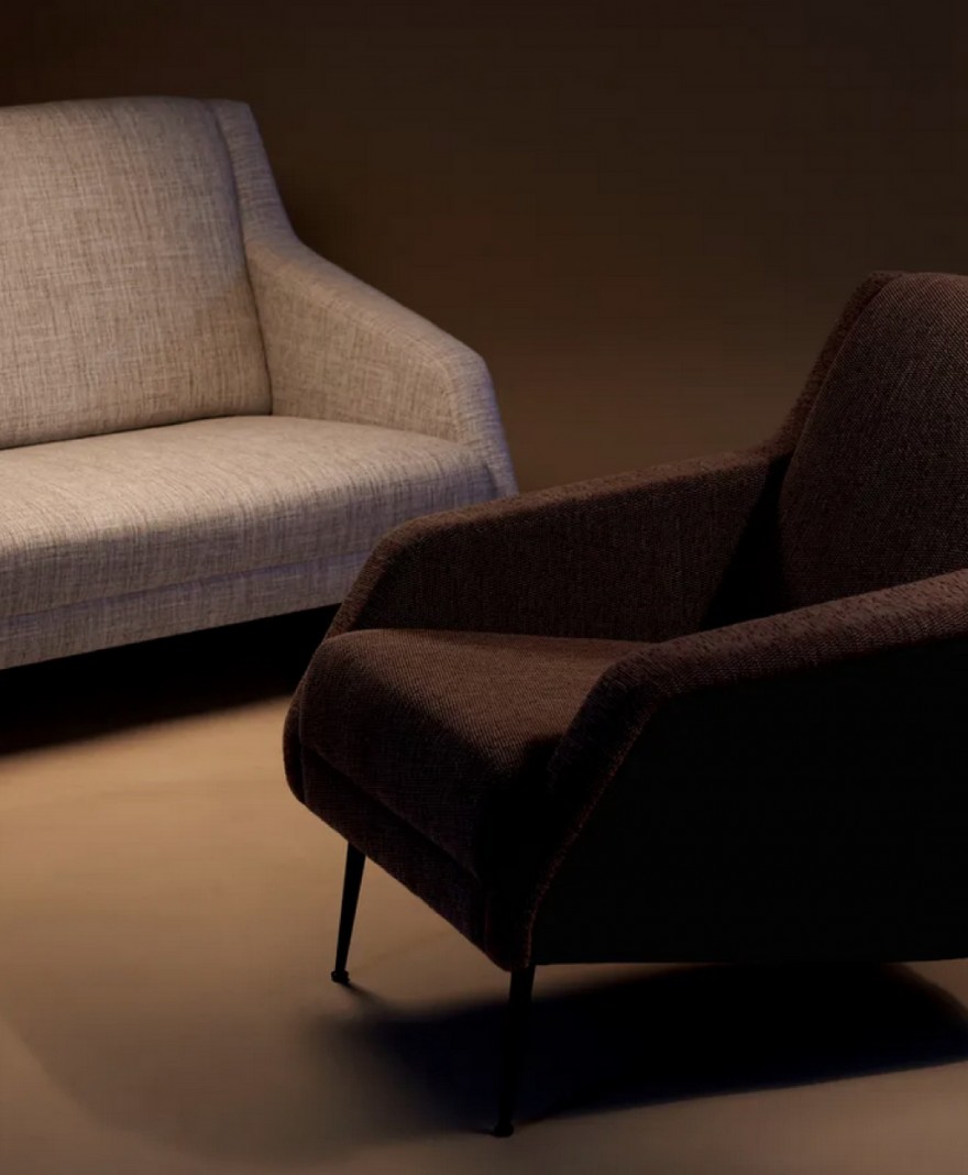 The CDC.1 Lounge chair with conic base is available in many fabric colours