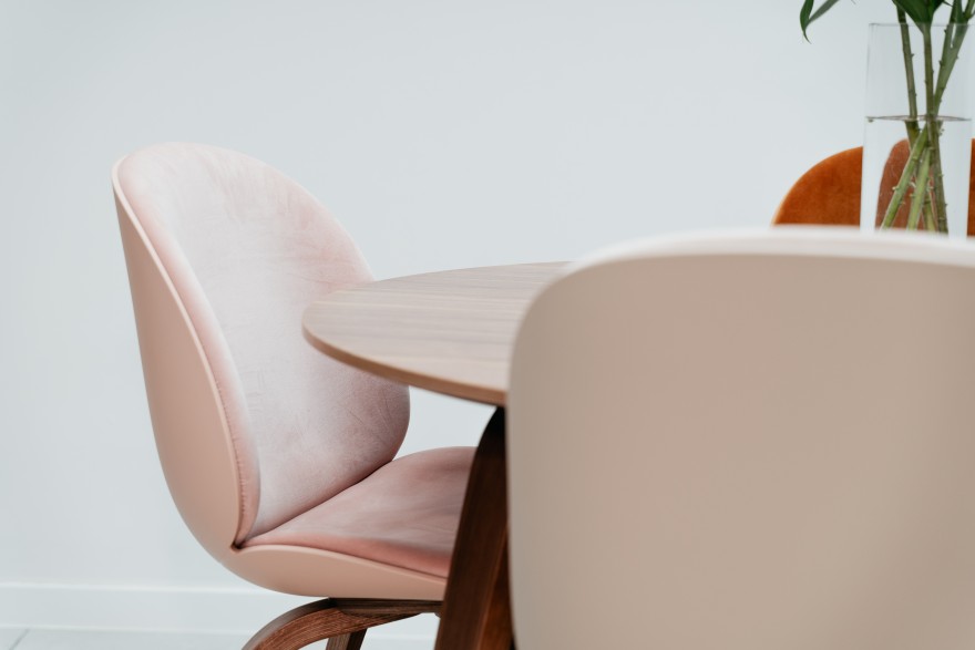 Detail of the Beetle dining chair and Gubi table in a city house 
